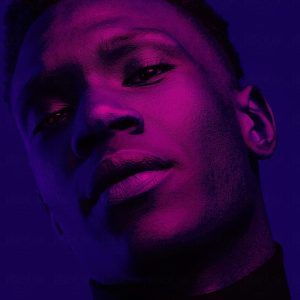 _African American Man Portrait Under Blue And Purple Lights - Ultraviolet_ by Stocksy Contributor _Ohlamour Studio_